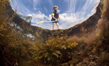 Boy rockpooling ©Alex Mustard/2020VISION