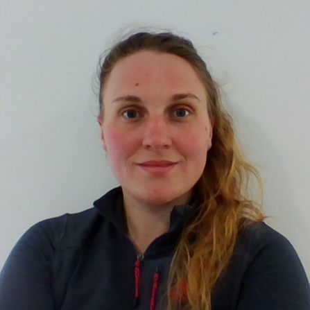 Headshot image of Alice smiling