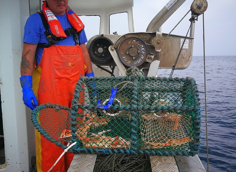 Creel and fisherman
